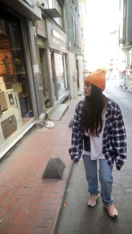 woman walking in a city street