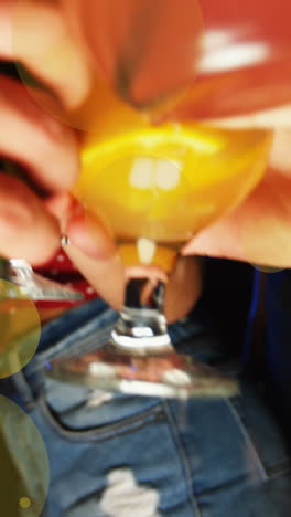 animation of spots over diverse friends with drinks