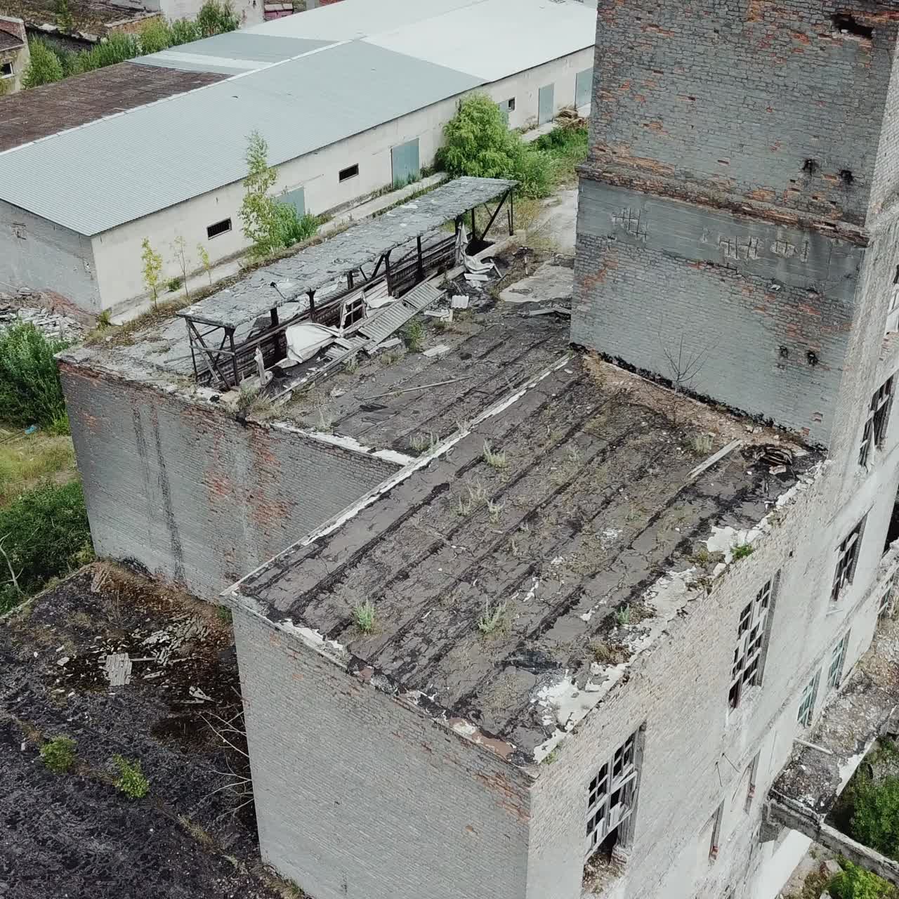 Abandoned industrial building. Ruins of an old factory. Aerial view