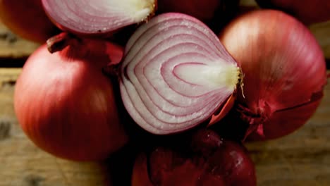 onions on a wooden table 4k