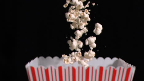 popcorn falling into bag in super slow motion