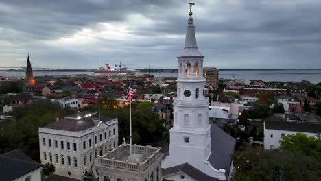 cruise ship in background aerial of st michaels church in charleston sc, south carolina