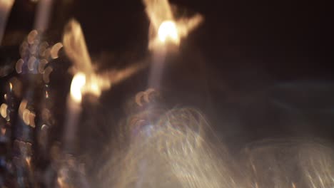 Decorative candles burning on a banquet table