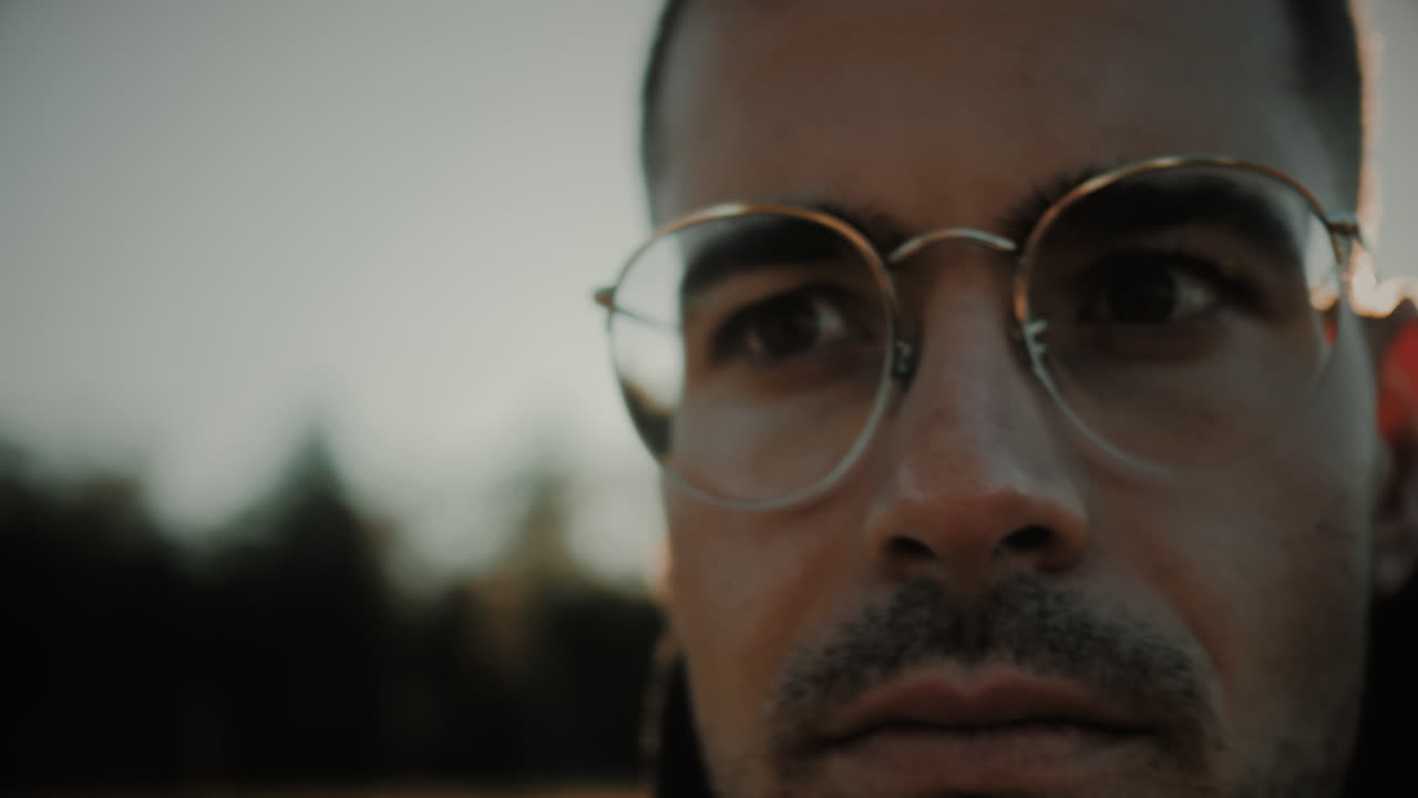 Eyes close-up of a young Caucasian male at sunset