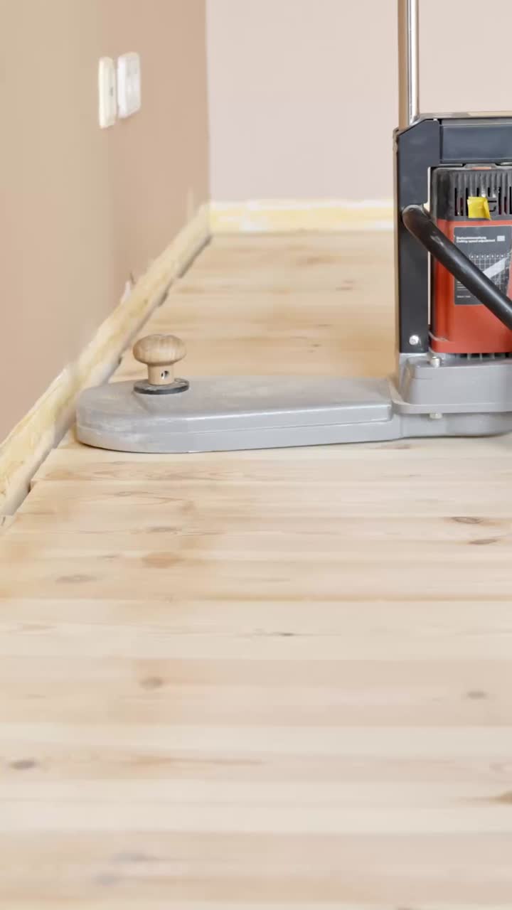 Edging Sander Machine, Person Sanding Wood Floor Edges For Home Improvement. Vertical Stock Footage Of Flooring Equipment