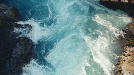 Static-camera-of-a-beautiful-aqua-blue-river-with-raging-white-water-rapids