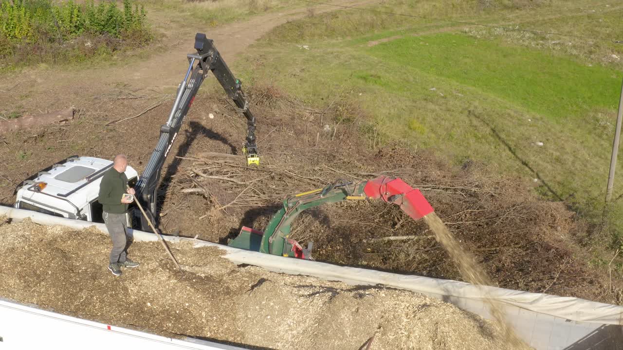 Wood Chipper Blowing Wood Chips And Saw Dust Into A Truck Free Stock ...