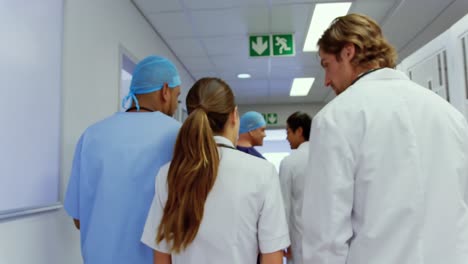 medical teams walking in the corridor at hospital 4k