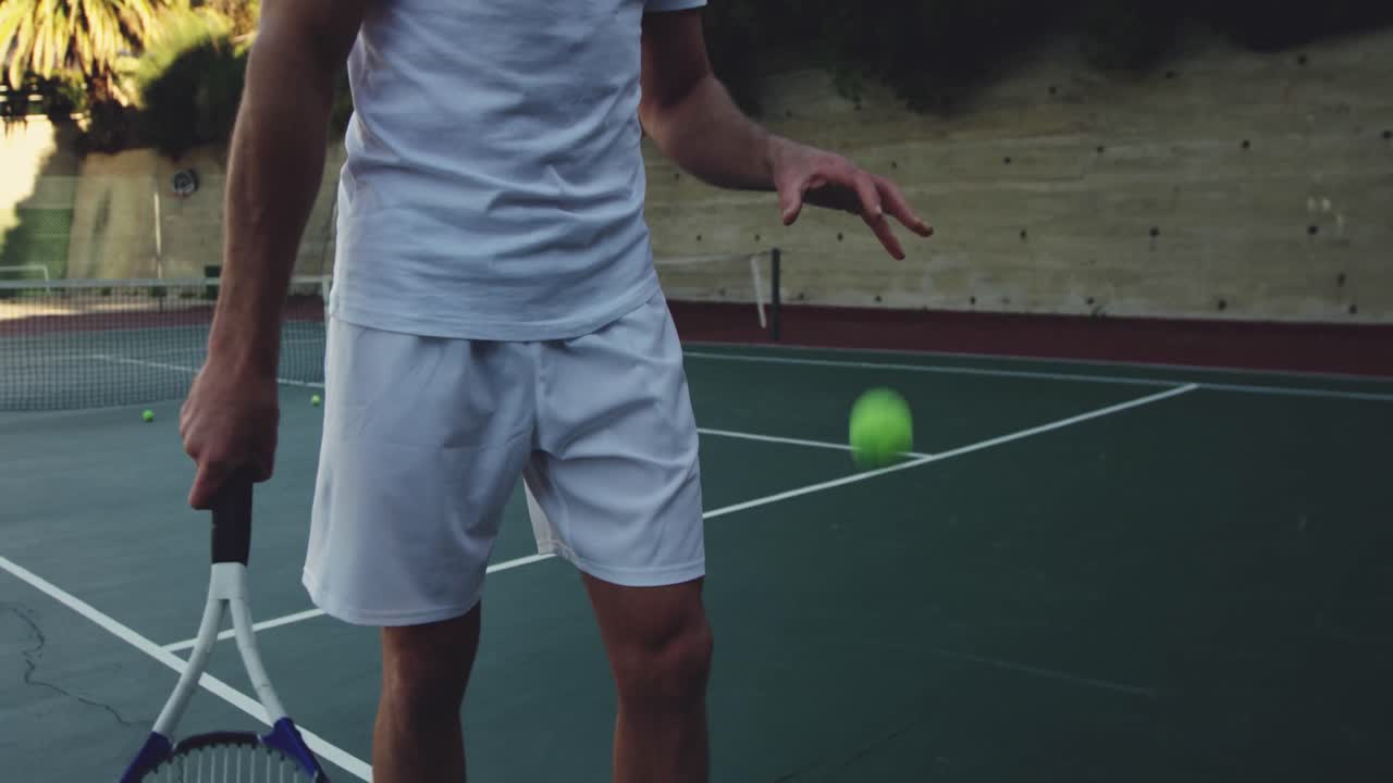 Man playing tennis on a sunny day