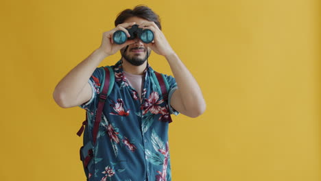 man with binoculars