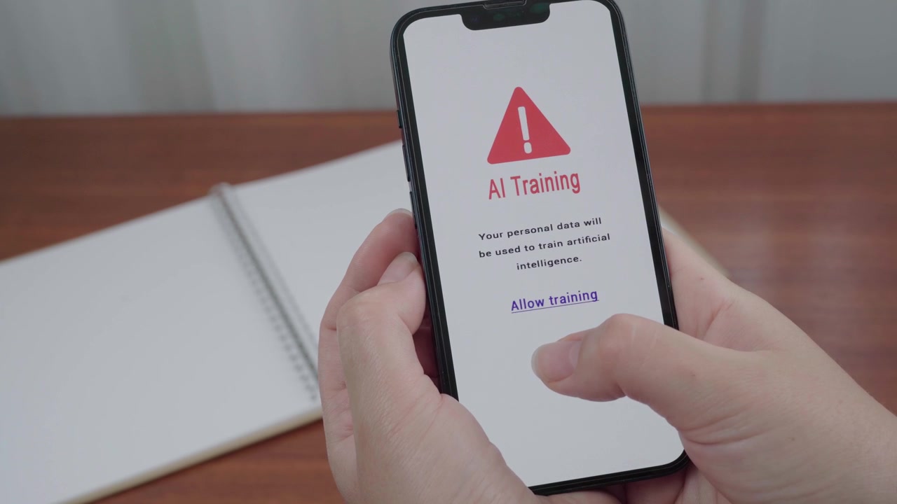 Closeup of a mobile AI training consent screen as a user considers allowing personal data to be used to train artificial intelligence.