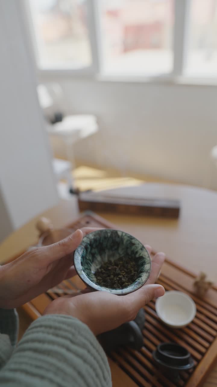 Tea cup held in hands