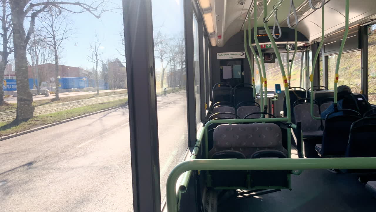 Inside a empty bus, during Coronavirus quarantine, on the streets of Helsinki, Finland