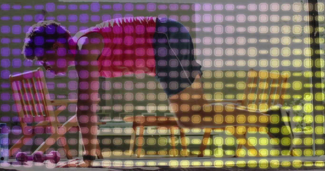 Upon unrolling yoga mat on hardwood floor, man performing rhythmic mountain climbers for fitness