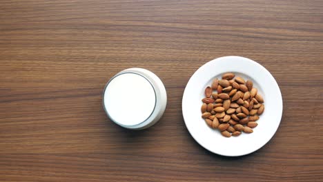 Almond-nut-and-milk-on-table-top-down