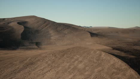 aerial view on big sand dunes in sahara desert at sunrise