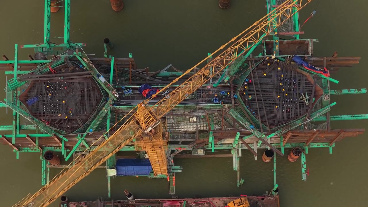 Aerial View of Bridge Construction Site on River