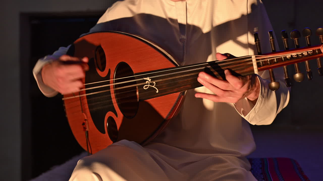 The oud, a staple of Arabic music, is played here by an Arab musician with deep cultural roots