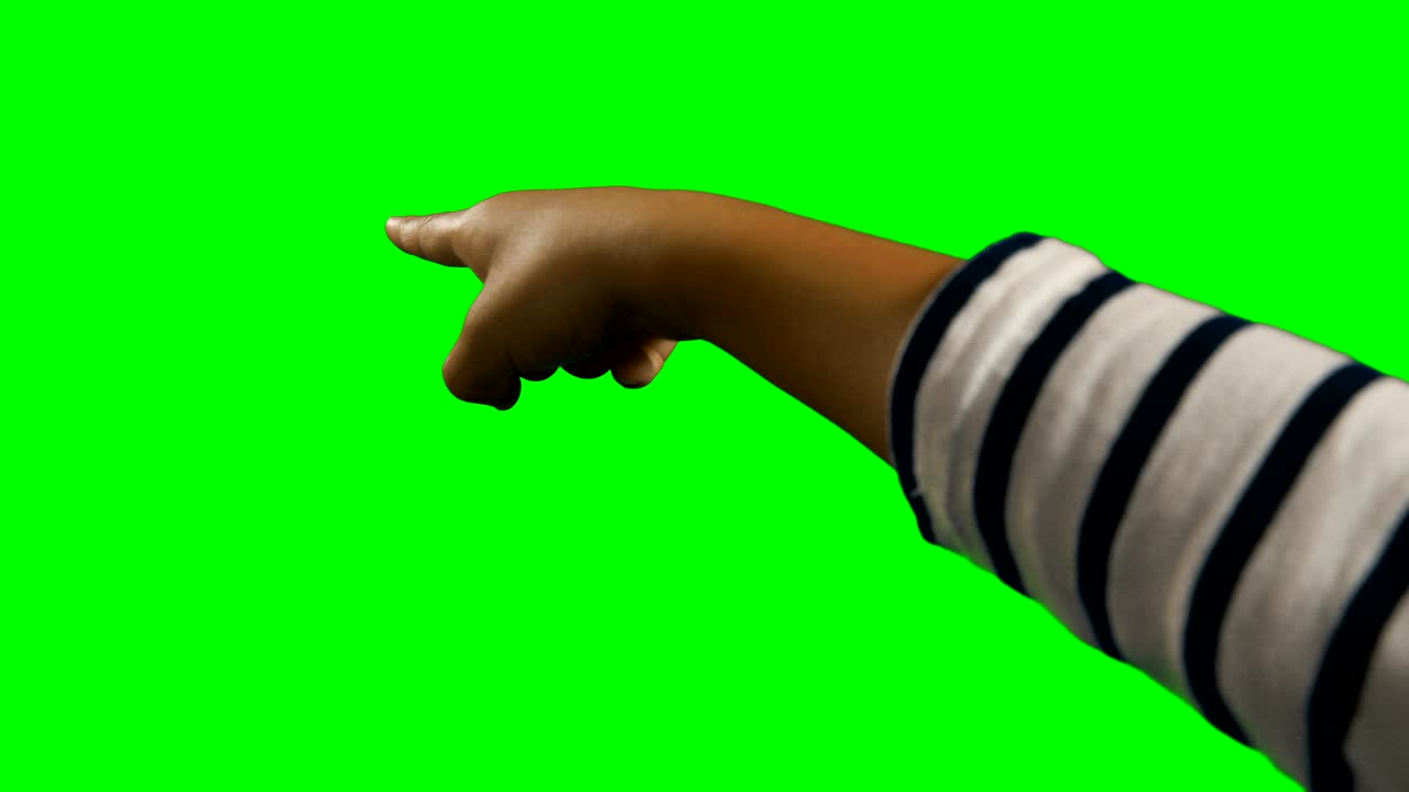 primer plano de la mano del niño señalando