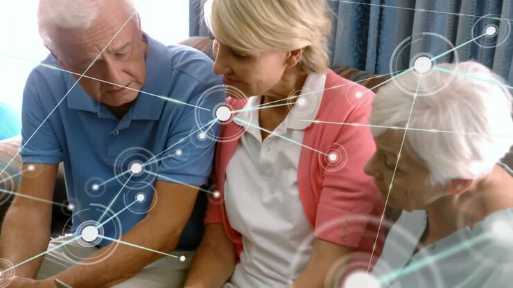 Animation of network of connections over caucasian senior people using laptop discussing at office