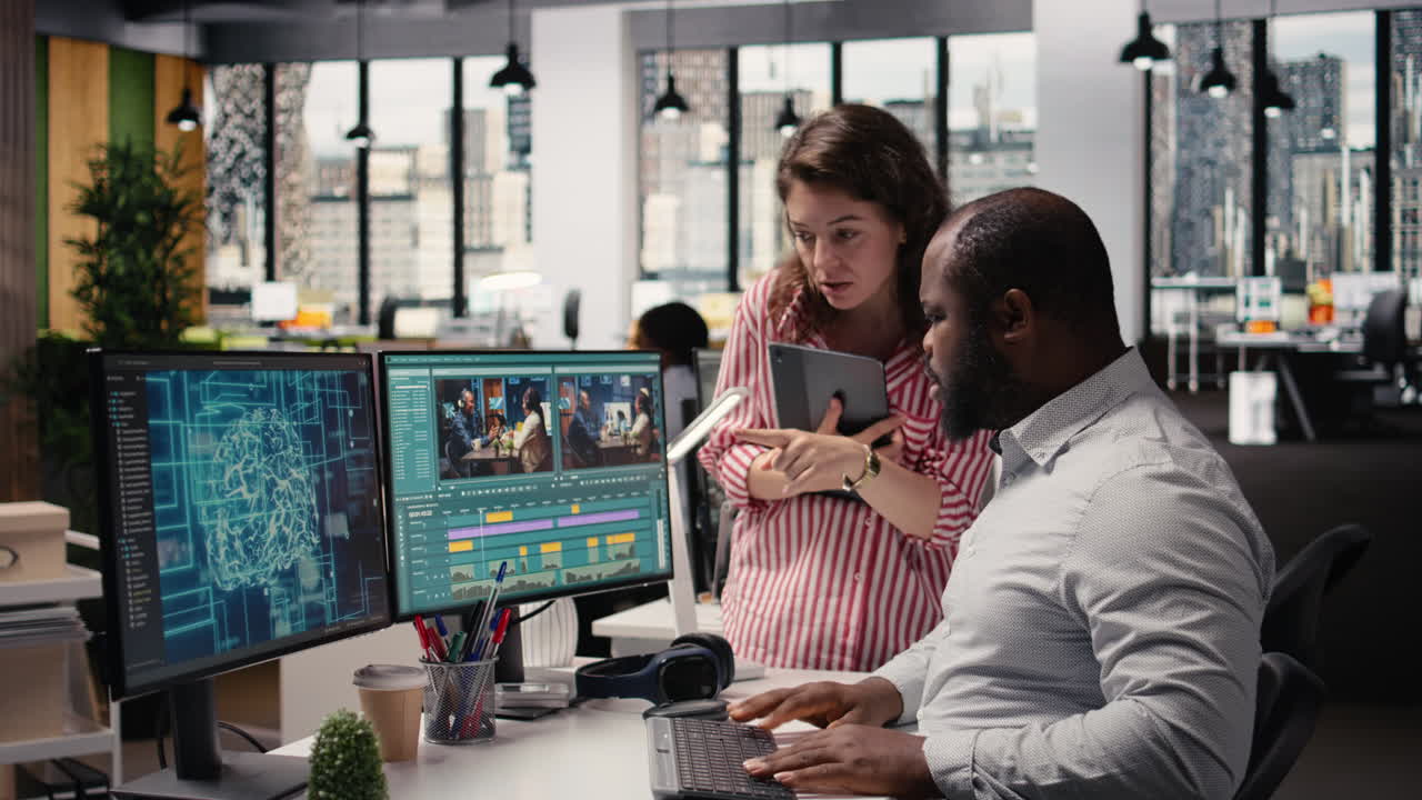 Creative team editing film footage with artificial intelligence software