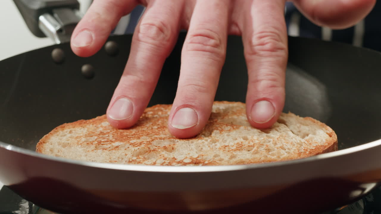 Toasting bread in a frying pan