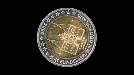 germany 2006 2 euro obverse with holstentor schleswig-holstein design rotating on black background
