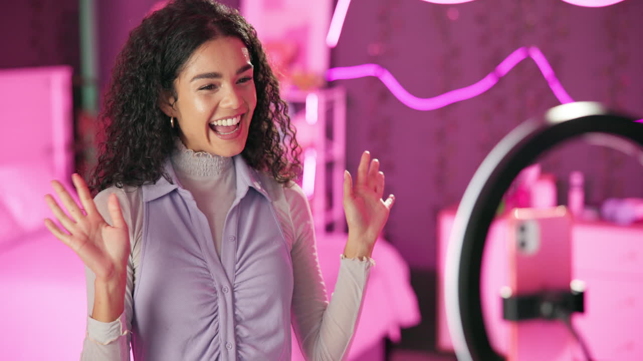 Woman recording video in bedroom