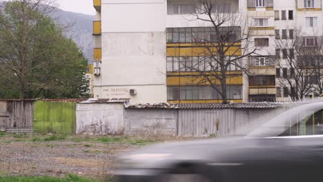 old, brutalist apartment building in post communist bulgaria in eastern europe.