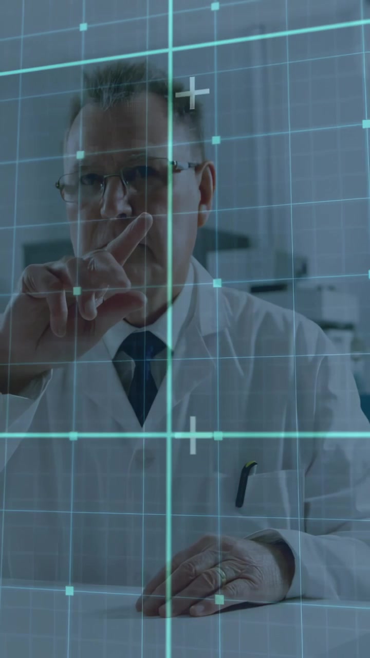 Video verticale: Medico anziano che tocca una griglia ciano, spostando nodi per una diagnosi medica, con la griglia che si assesta.