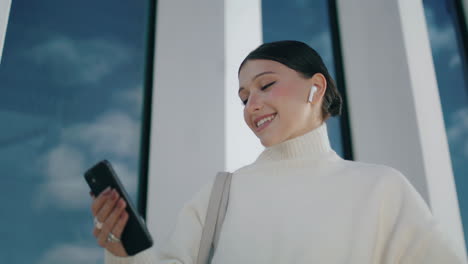 Girl-talking-phone-camera-standing-on-street-close-up.-Woman-video-call-vertical