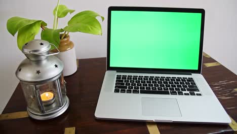 A-laptop-with-a-green-screen-which-can-be-removed-to-place-any-content-as-per-the-requirement