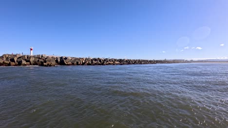 boat approaching jetty on gold coast, australia