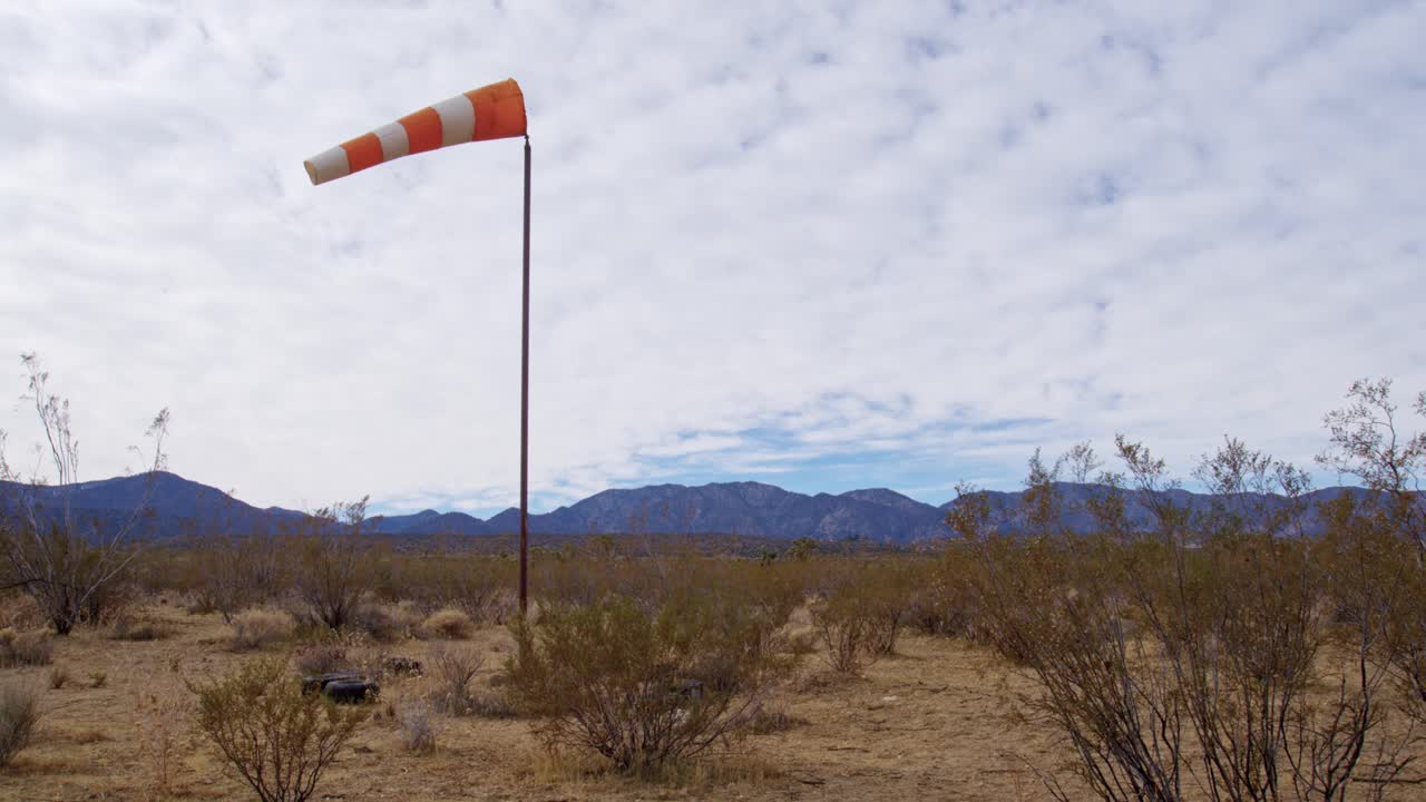 Windsock in a Desert Landscape