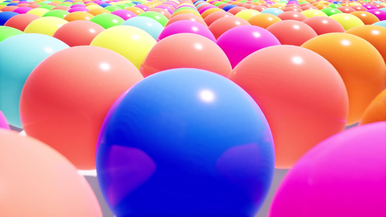 다채로운 플라스틱 공의 현실적인 필드에서 카메라의 움직임.