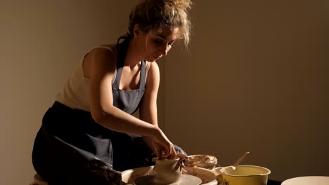 creating jar or vase of clay.