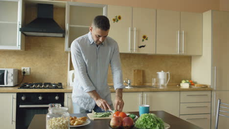 man preparing vegetables in the kitchen