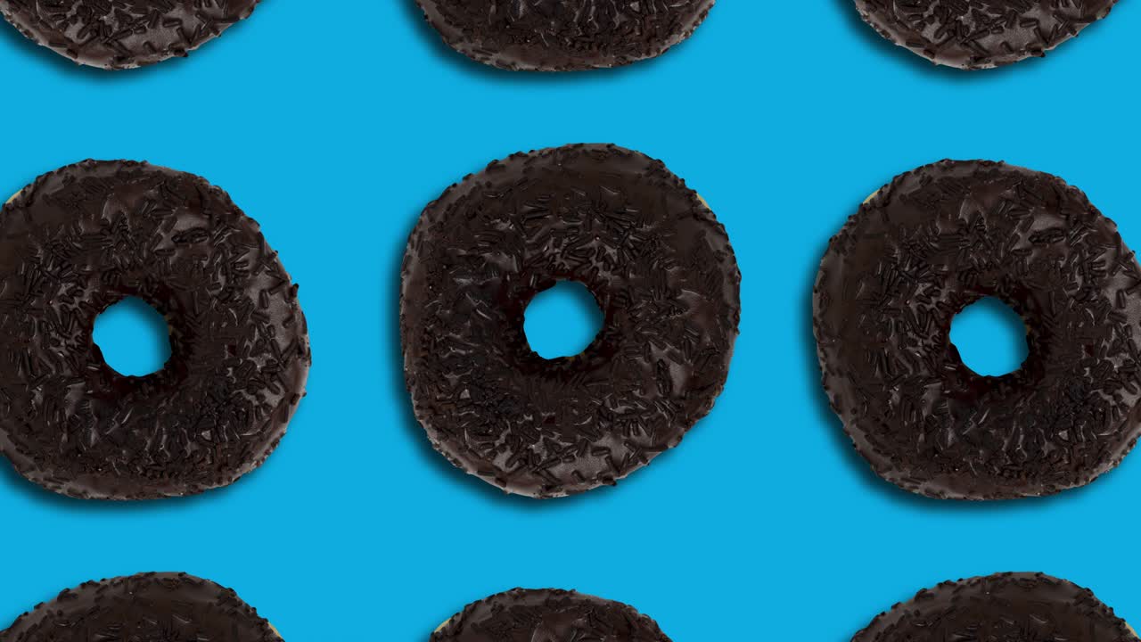 파란 바탕에 초콜릿 도 패턴, 간단한 모션 그래픽, 원활한 루프 음식 개념 애니메이션