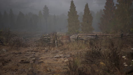 an old wood fence with a country field behind it