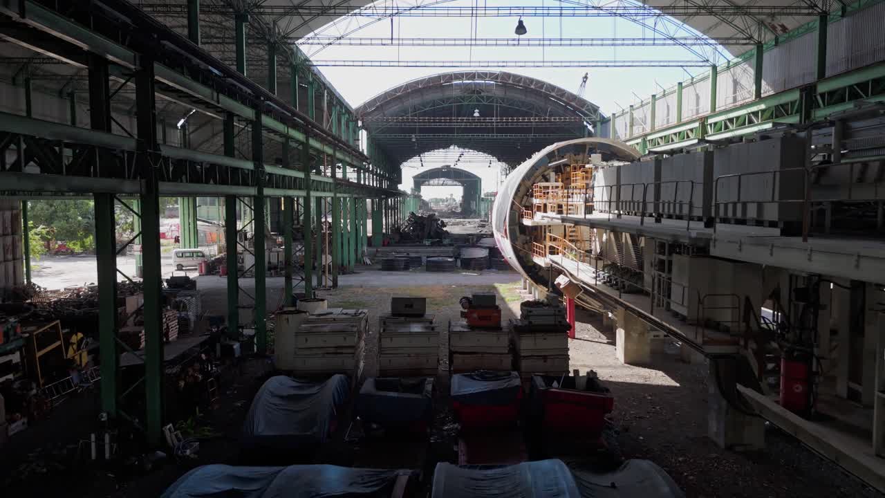 Interior view of abandoned Dominican Metallurgical Complex, Metaldom, heavy industrial machinery, metal structures, large production facility, ideal for industry visuals, Dominican Republic