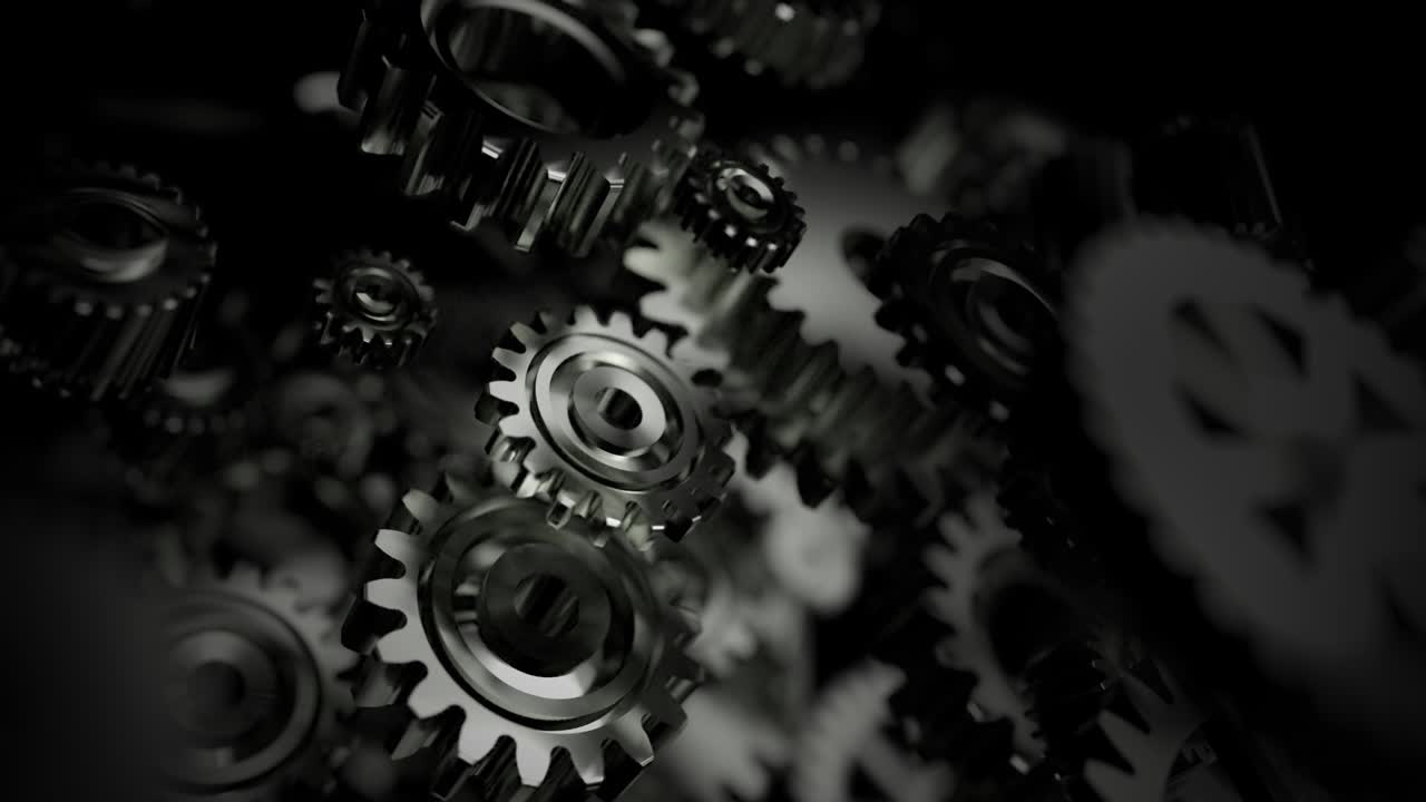 3D Rendering metal gear wheel spinning rotation, for teamwork success and technology concept, with a depth of fie