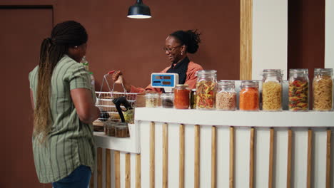 African-american-woman-buying-freshly-harvested-produce