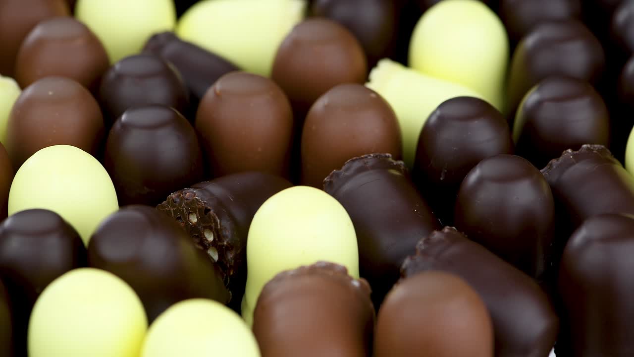 marshmallows de chocolate como imágenes de bucle sin costuras