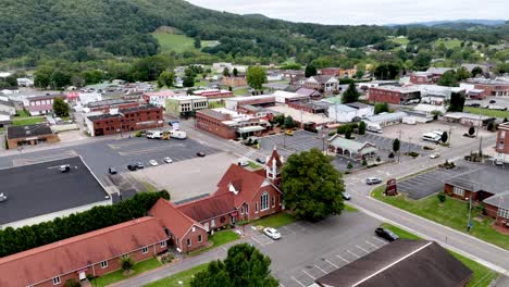 aerial orbit over the city of mountain city tennessee, small town america, hometown usa