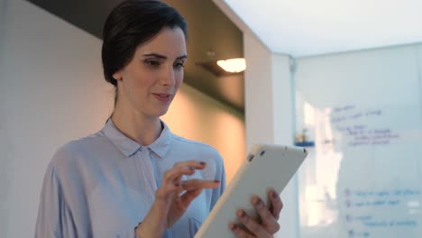 female executive using digital tablet 4k