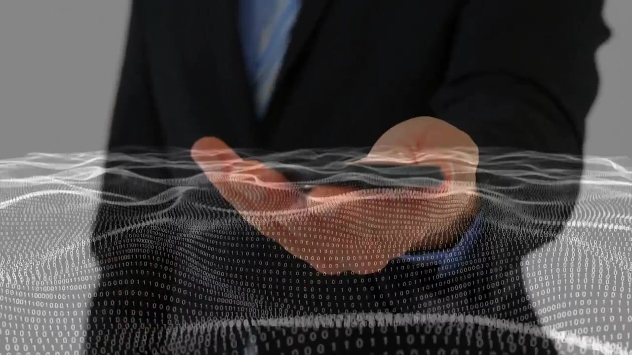 Business presenter tapping and sweeping hands on gray backdrop, showing binary data mesh for demo