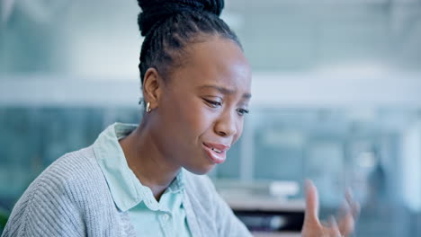 Sad,-talking-and-frustrated-black-woman-at-work