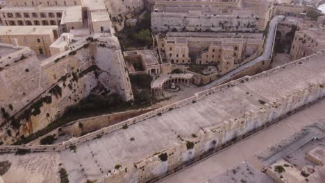 done flight from outward of the sea over the walls of valletta castle malta