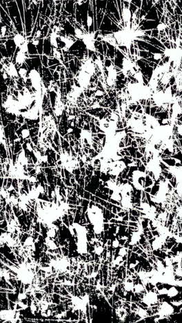 abstract white streaks and cracked glass on black background