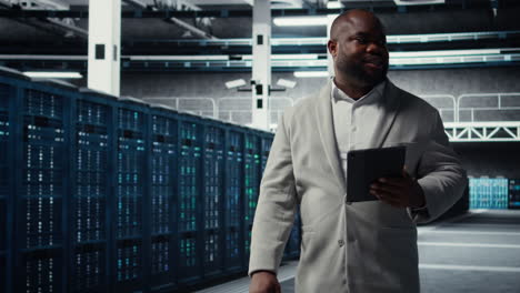 vertical video server farm employee upgrading gear for increased processing